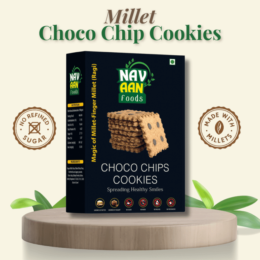 Box of Navaan Millet Choco Chip Cookies made with jaggery and finger millet, placed on a wooden stand with health benefit icons